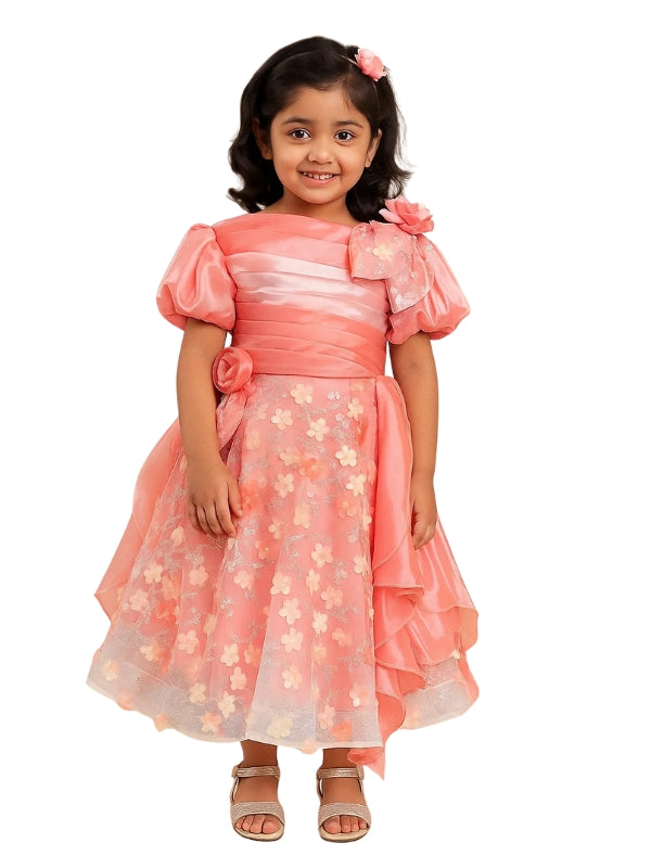 Young girl wearing a pink floral dress on a white background