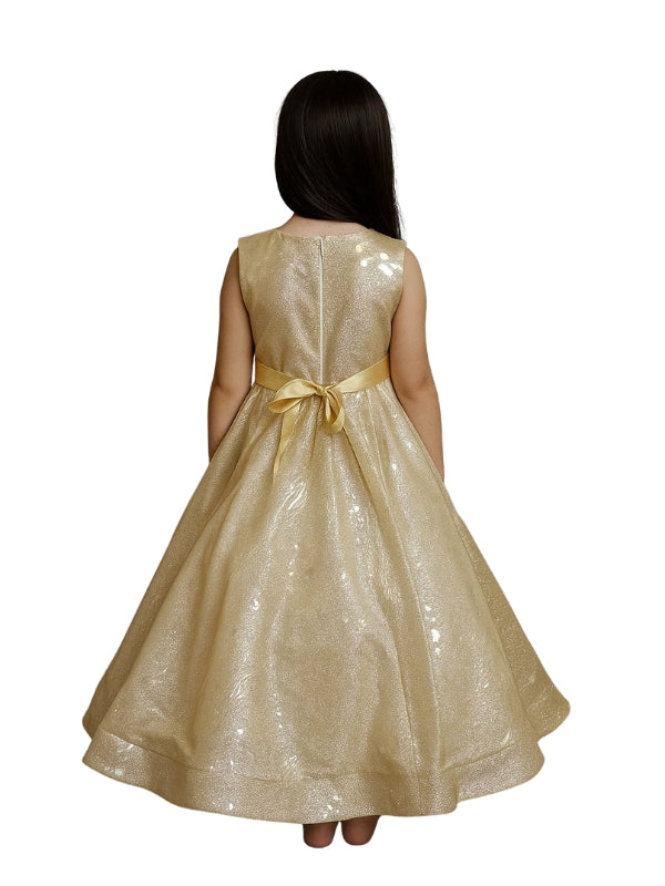 Gold dress with a bow on the back worn by a person on a white background