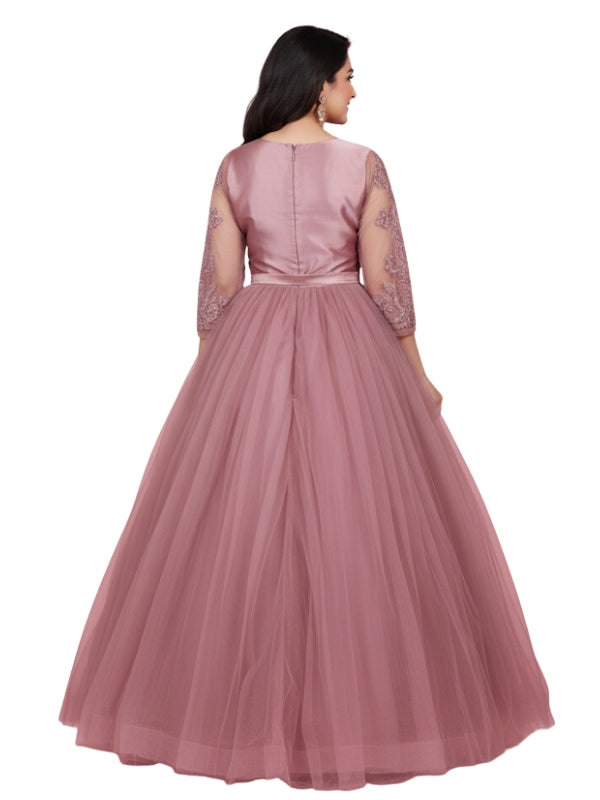 Pink evening gown with lace sleeves on a white background