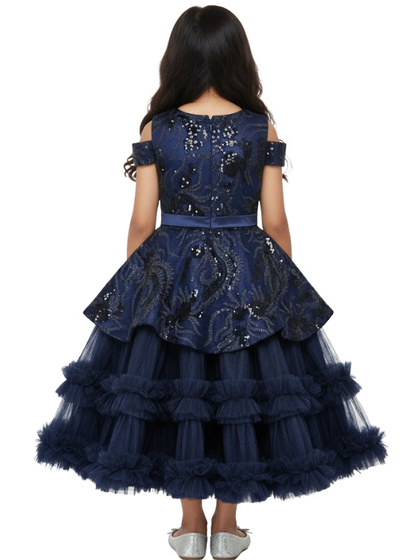 Navy blue dress with intricate detailing on a white background