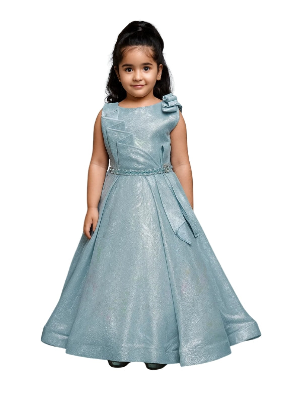 Young girl wearing a light blue formal dress with a bow on a white background