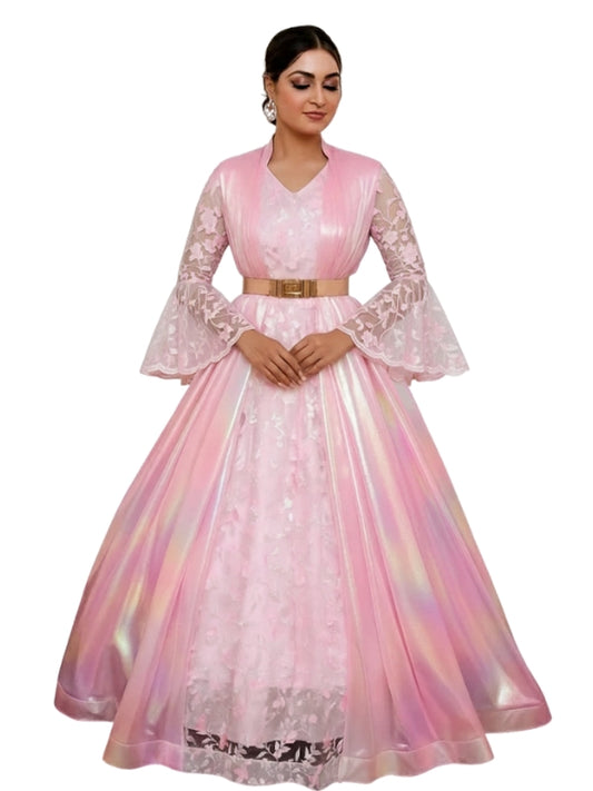 Woman wearing a pink and white embroidered dress on a white background