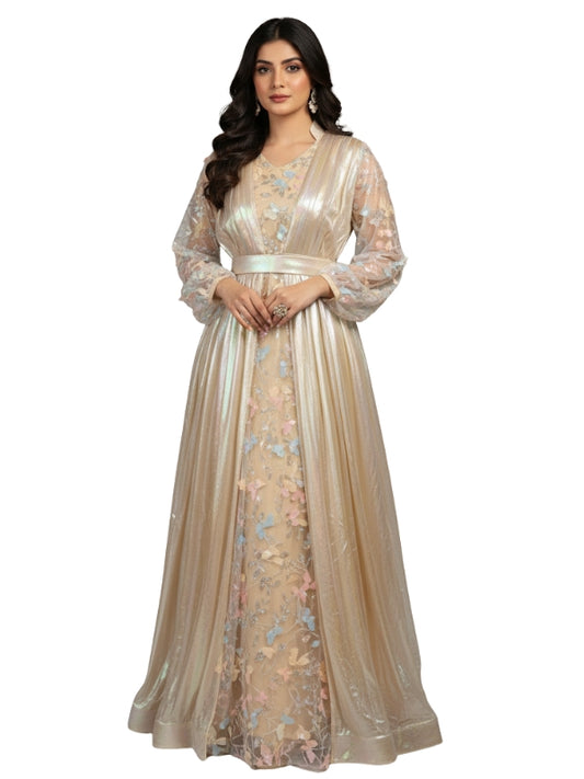 Woman wearing a beige floral embroidered dress on a white background