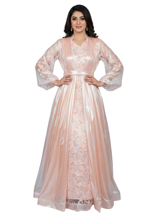 Woman wearing a light pink lace dress on a white background