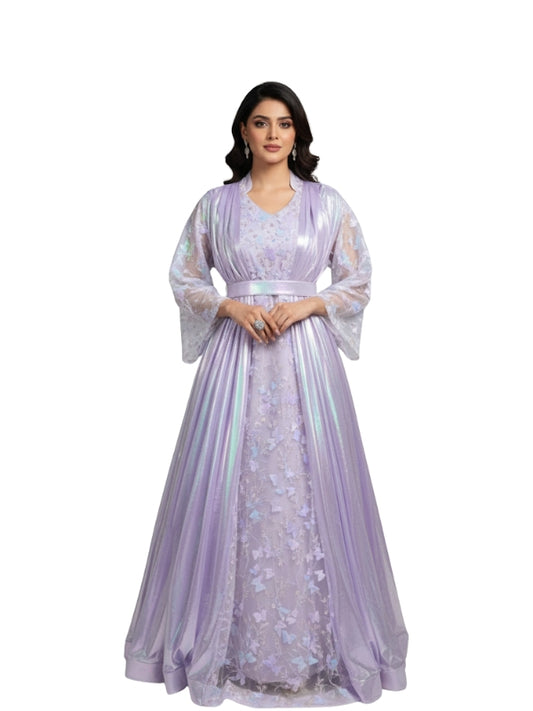 Woman wearing a light purple embroidered dress on a white background