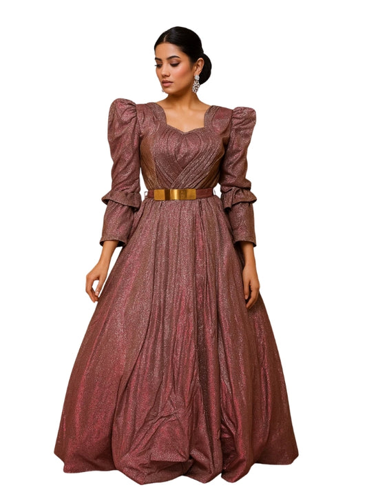 Woman wearing a long, elegant brown dress with puffed sleeves on a white background