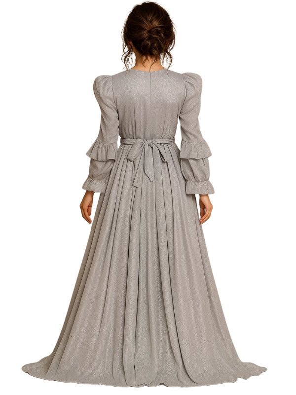 Long gray dress with puffed sleeves on a white background