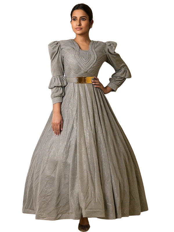 Woman wearing a gray dress with puffed sleeves and a gold belt on a white background