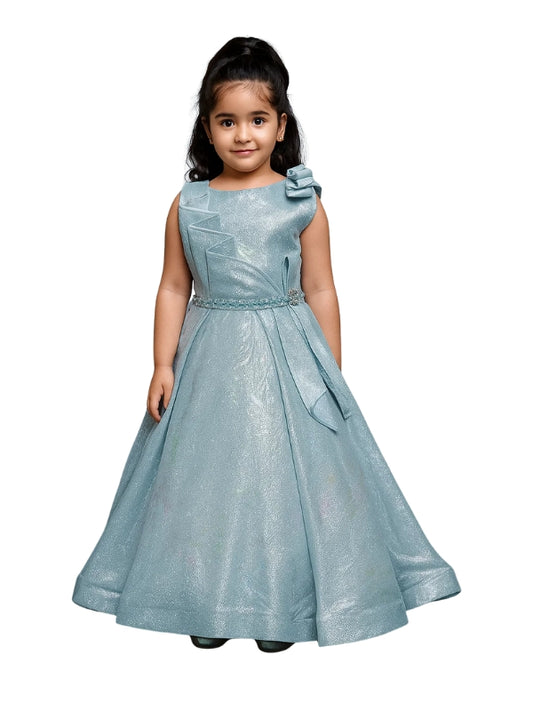 Young girl wearing a light blue formal dress with a bow on a white background