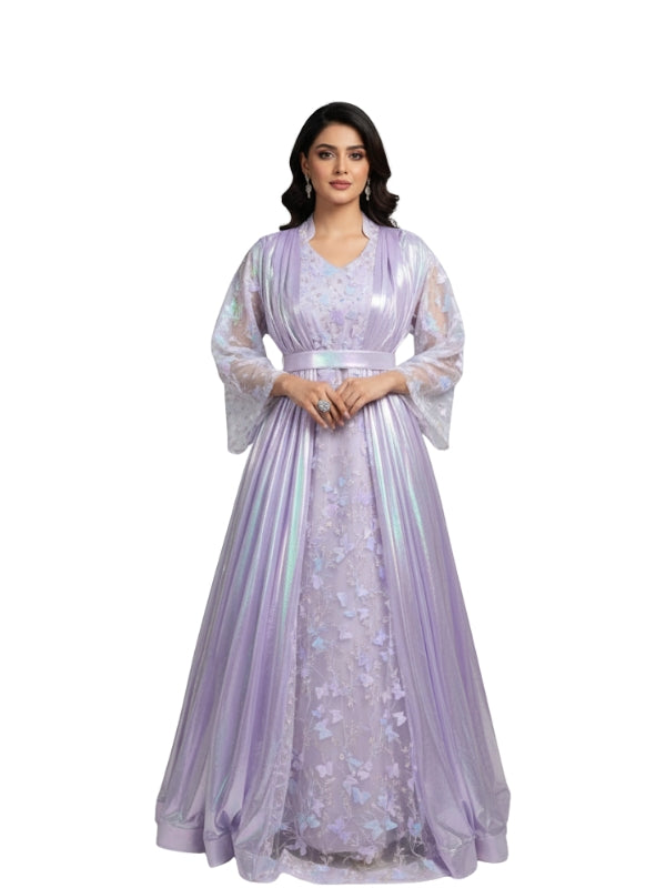 Woman wearing a light purple embroidered dress on a white background